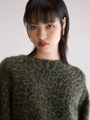 Groene trui met luipaardprint dioal