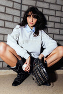 Grijze sweater met parel franjes