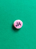 Positieve broche