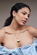 Ketting met gouden schelp hanger