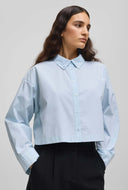 Licht blauwe cropped blouse liene zenika