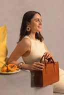 Jackie midi classic leather cognac