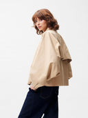 Beige cape jas