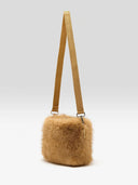 Faux fur tas hochet