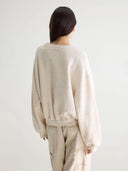 Ecru sweater met spikkels fancy61