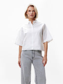 Witte blouse met open rug