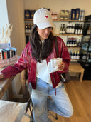 Rode lak jas met tuck in effect