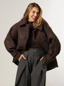 Boucle cape jas