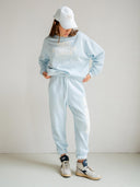 Lichtblauwe sweater met tekst