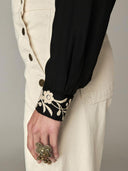 Zwarte blouse geborduurd antonio
