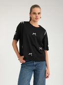Zwart t-shirt met parelstrikjes nubetunia