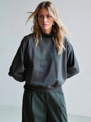 Groene sweater met tekst