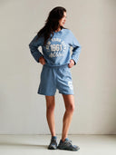 Blauwe sweater met vintage logo print