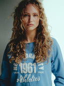 Blauwe sweater met vintage logo print