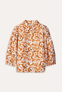 Oranje blouse met print adventure