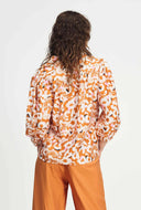 Oranje blouse met print adventure