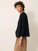 Zwarte trui met knopen austin