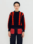 Vest met rood detail