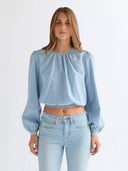 Lichtblauwe blouse drift knot