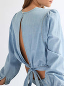 Lichtblauwe blouse drift knot