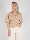 Beige top pien