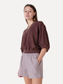 Bruine top met v-hals amice