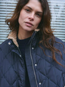 Donker blauwe bomber jacket