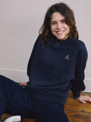 Sweater met backprint niya amsterdam