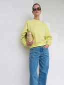 Gele sweater deline