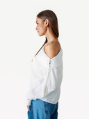 Offwhite top met asymmetrische hals dezi