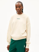 Creme sweater met opdruk alizaa preserve