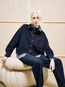 Donkerblauwe denim blouse nalaani
