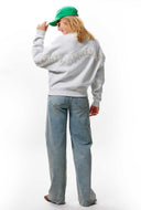 Grijze sweater met parel franjes