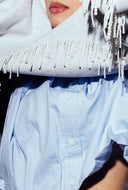 Grijze sweater met parel franjes