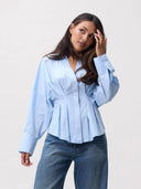 Lichtblauwe blouse met taille plooien