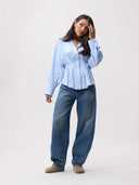 Lichtblauwe blouse met taille plooien