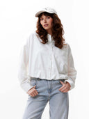 Offwhite blouse met tuck in effect