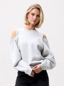 Grijze sweater met cut outs