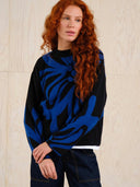 Zwarte sweater met bloem limhamn