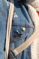 Broche zwarte tally vos