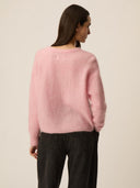 Roze gebreid vest dobilou