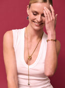 Armband met touw en gouden schakels aubergine