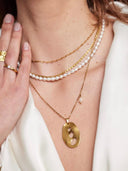 Fijne off-white parelketting