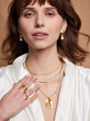Fijne off-white parelketting