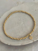 Gouden balletjes armbandje (s)