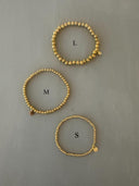 Gouden balletjes armbandje (s)
