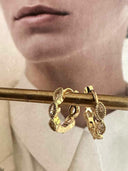 Gouden oorringetjes met transparante steentjes