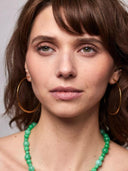 Gouden platte gehamerde oorringen large (6.2cm)