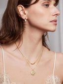 Gouden ketting met munt