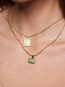 Korte ketting met rechthoekige gemstone hanger